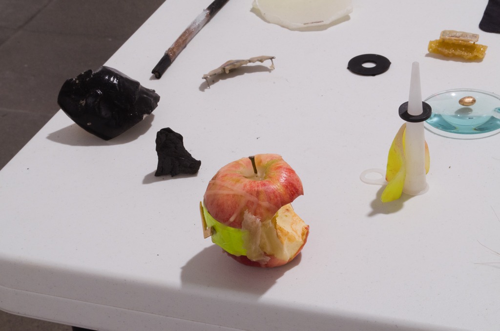 Mobil Ave 4, 2016, ephemeral installation, objects in decomposition on a table, by Daniel Perez Coronel